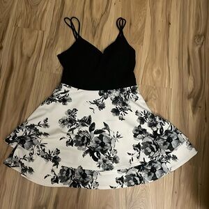 floral black and white tiered dress with lace on back. zipper back